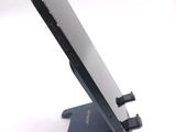 a cell phone that is sitting on a stand