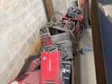 a lot of tools that are sitting on the floor