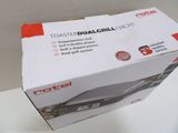 packaging of a toaster with a box on top of it
