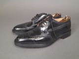 men ' s black leather brogue shoes with laces on the sole