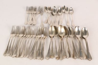 a lot of silver spoons and spoons on the table