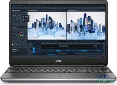 L'ordinateur portable Dell est ouvert sur un fond blanc, avec une vue urbaine en arrière-plan.