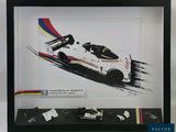 a picture of a picture of a race car in a frame