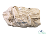 a large bag of luggage sitting on top of a white surface