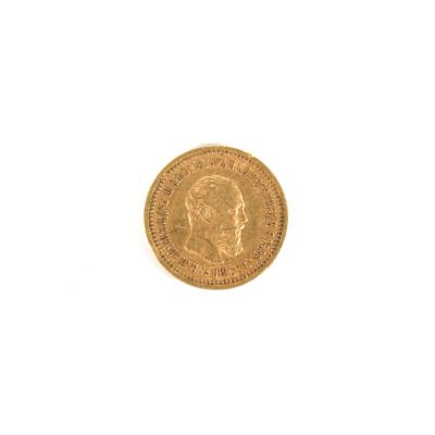 une image d'une pièce d'or sur fond blanc
