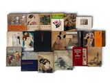a lot of books that are sitting on a table