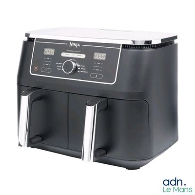 an image of a black and silver air fryer on a white background