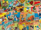 a lot of cartoon comics on the table