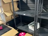 many boxes and boxes on the shelves in the room