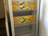 a refrigerator that has a bunch of food inside of it