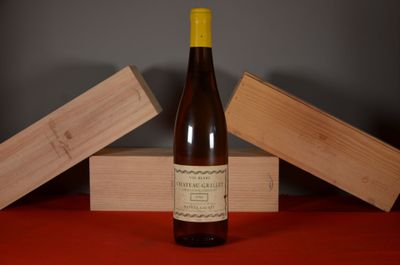 a bottle of wine that is sitting on a table