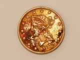 an image of a gold coin with a santa clause on it