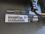a label on the back of a laptop that says philips