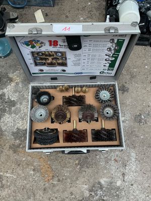 a box with a variety of tools inside of it