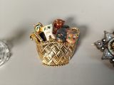 three different types of brooches on a table