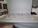 a lot of empty wine glasses sitting on a table