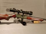 the rifle is laying on the table ready to be used