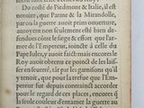a close up of a book with an open page on it