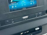 a picture of a car dashboard with a car radio in it