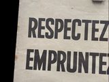 a sign that says respectez emprunte on it