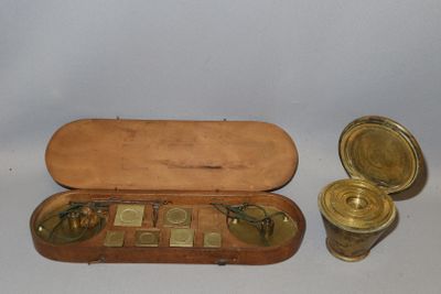 a small wooden case with a pair of glasses in it