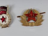 six badges of different shapes and colors are displayed on a white surface