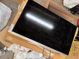 a television that is sitting in a box on the floor