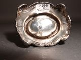 a silver object that is sitting on a table