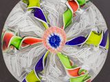 a glass plate with a colorful design on it
