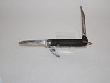 a knife that is laying on top of a table