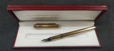 an image of a pen and a box with a pen in it