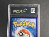 a close up of a pokemon card on a table