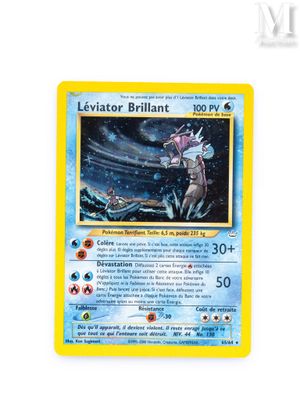 a close up of a pokemon card on a white surface