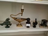 a shelf that has a lot of different items on it