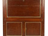a mahogany and brass mounted cabinet with two doors and two drawers