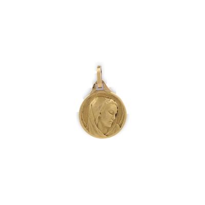 gros plan d'une pièce d'or portant un visage de femme