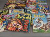 a lot of comic books that are on a table