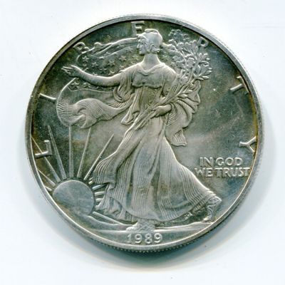 an image of a close up of a coin on a white surface