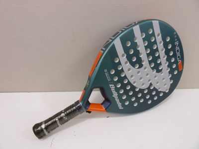 a tennis racket that is sitting on a table