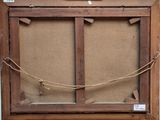 an old wooden easel with a piece of paper on top of it
