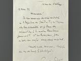 an old letter written in french on a piece of paper