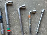 a lot of tools that are laying out on the ground