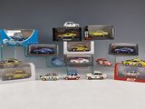 a lot of toy cars that are in a display case