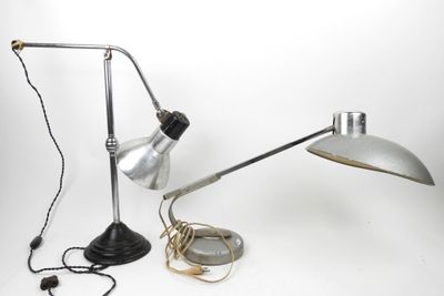 a lamp that is sitting on a table next to a lamp