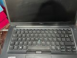 a laptop computer that is sitting on a table