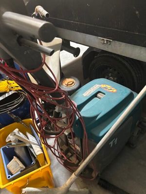 a picture of a truck with a bunch of wires on the back of it