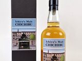 an image of a bottle of whisky next to a box