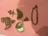 a lot of different items that are on a pink surface