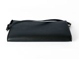 a black purse on a white background
