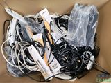 a box full of wires and cords in it